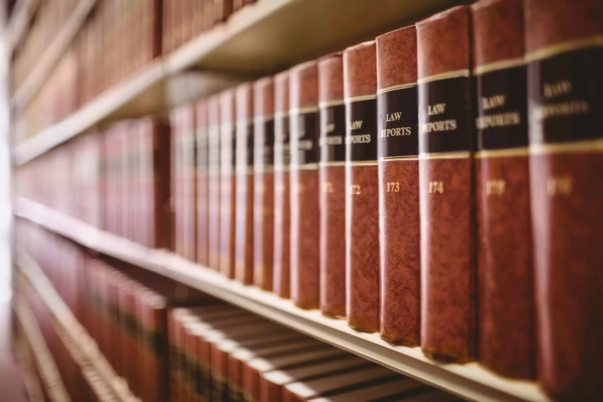 A book shelf filled with law books